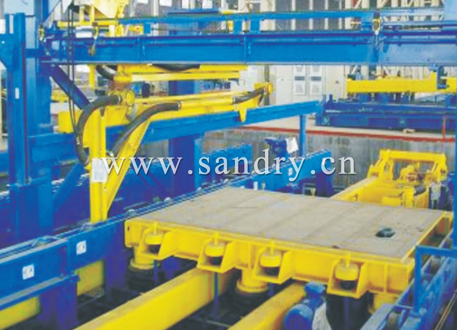 Auto-molding line vibrating table